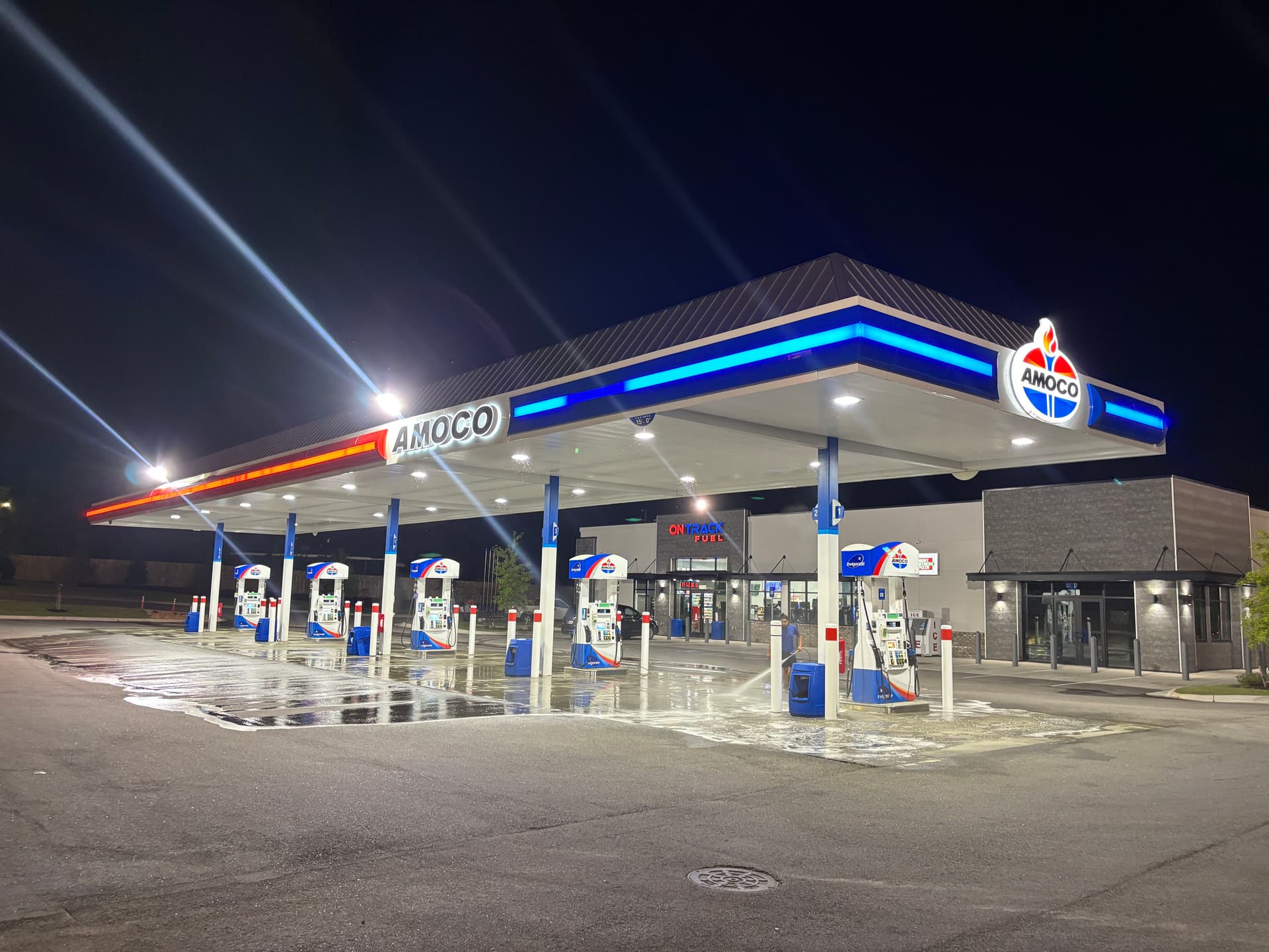 Night Pressure Washing at a High-Traffic Gas Station image